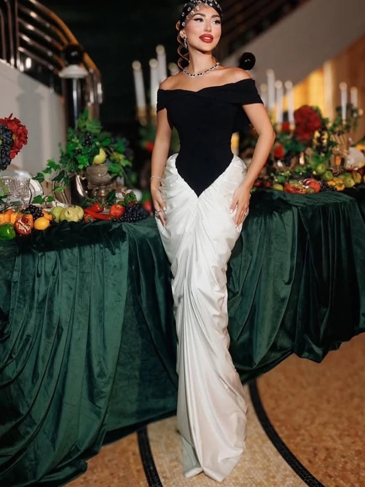 Backless long dress with ruched high-waist design and contrast panel detailing
