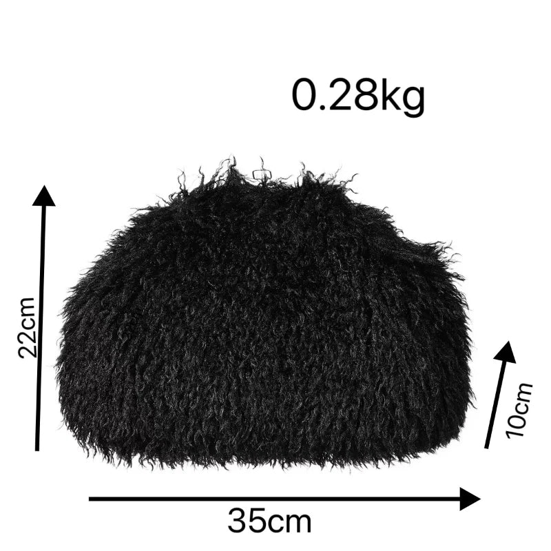 A black shaggy faux fur cushion or seat pad shown on a white background with measurement arrows and text indicating dimensions: 35cm wide, 22cm high, 10cm deep, and weight 0.28kg.