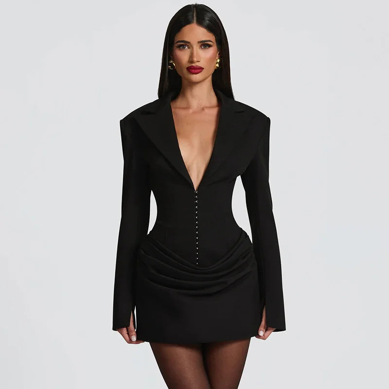 Black long sleeve deep V mini dress with structured silhouette and gathered high-rise skirt
