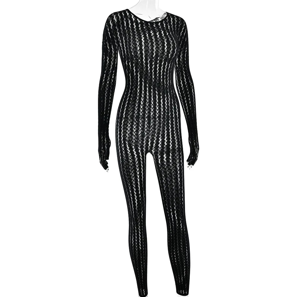 Black textured mesh jumpsuit with vertical wave jacquard detailing and elastic finish
