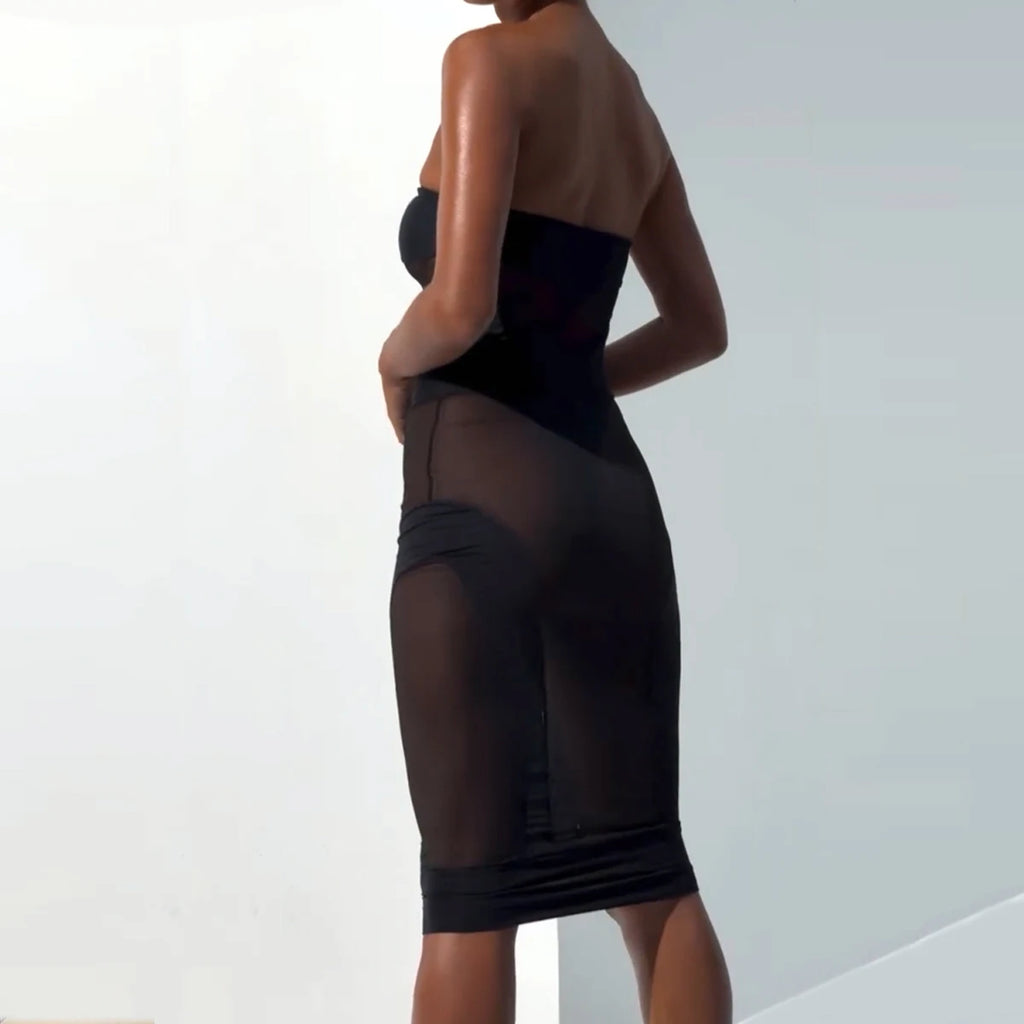 High-waist black mesh skirt and sheer strapless top set with sculpting bodycon design
