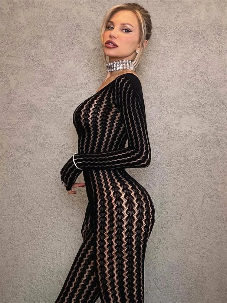 One-piece black see-through jumpsuit with sculpting jacquard pattern and full coverage legs
