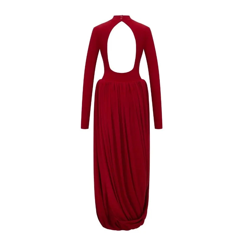 Red dress with long sleeves and cut-out design on a white background