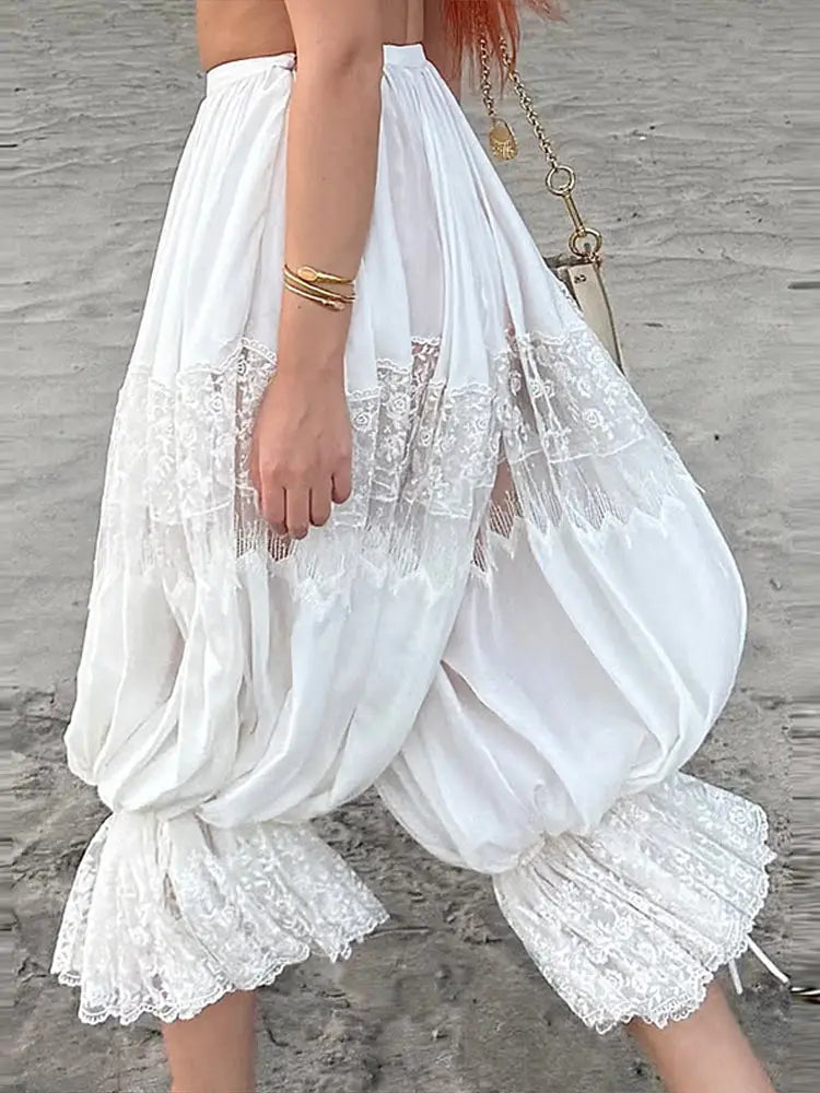 Bohemian white lace beach pants with floral embroidery details
