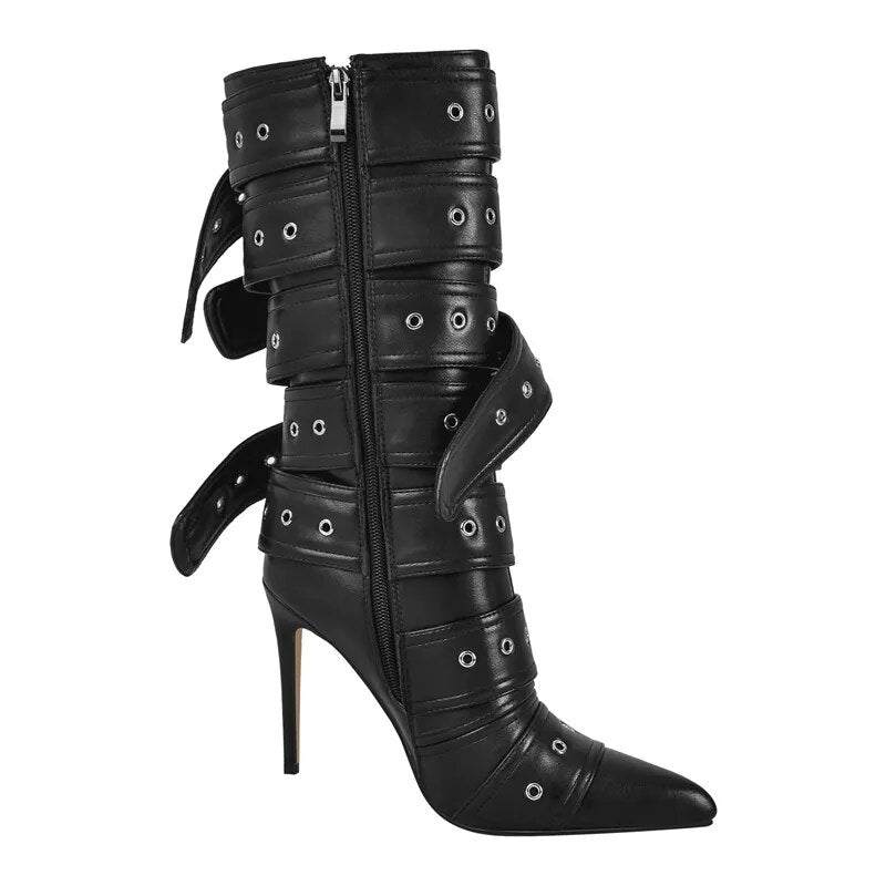 POINTED HEELED BOOTS decorated with BELTS