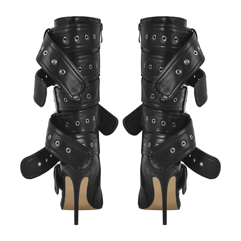 POINTED HEELED BOOTS decorated with BELTS