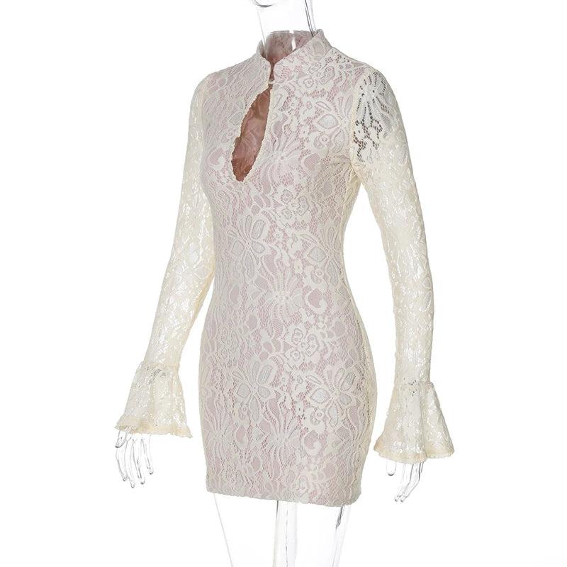White lace dress on a mannequin against a white background
