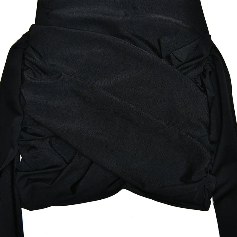 Black skirt with ruffled details on a white background