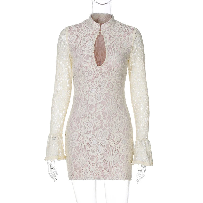 White lace dress on a mannequin against a white background
