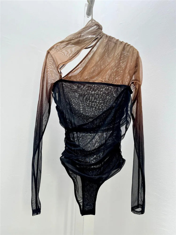 Black and beige bodysuit with sheer long sleeves on a white background