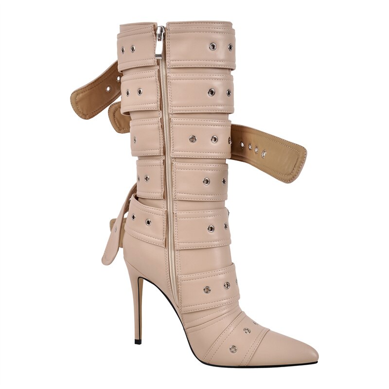 POINTED HEELED BOOTS decorated with BELTS