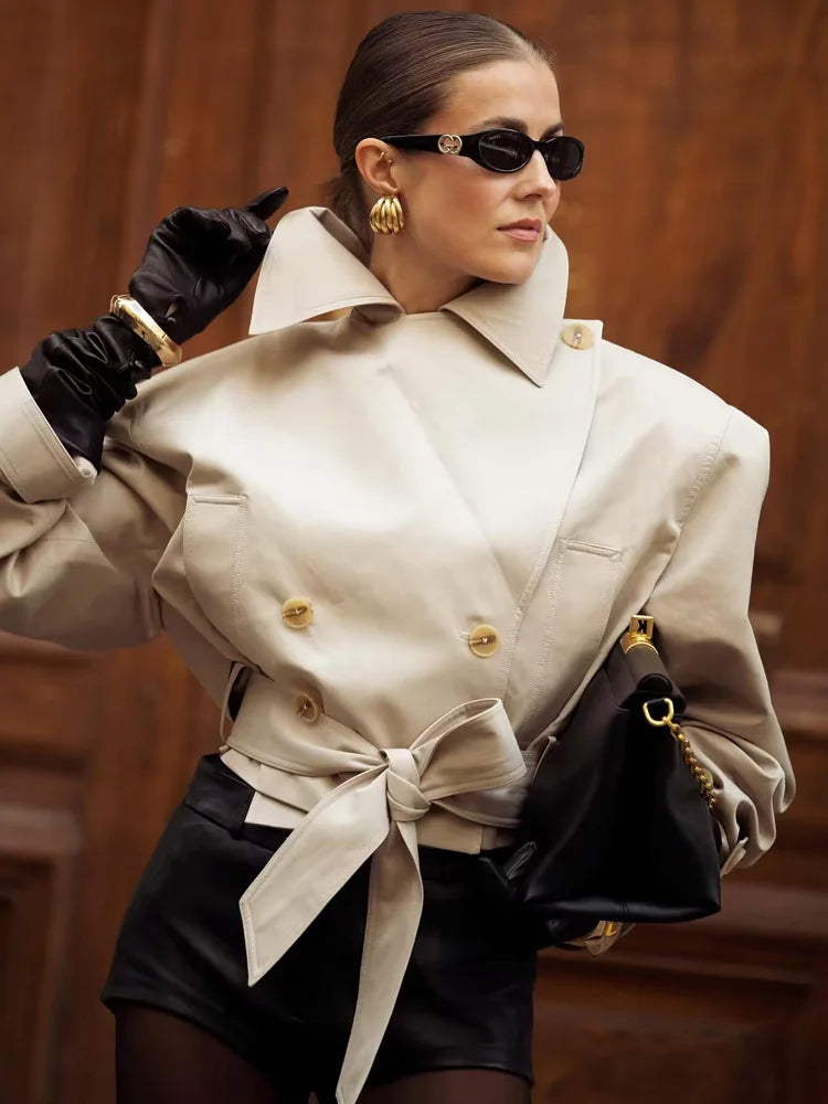 Fashionable double-breasted trench coat for women in beige with adjustable belt and pockets