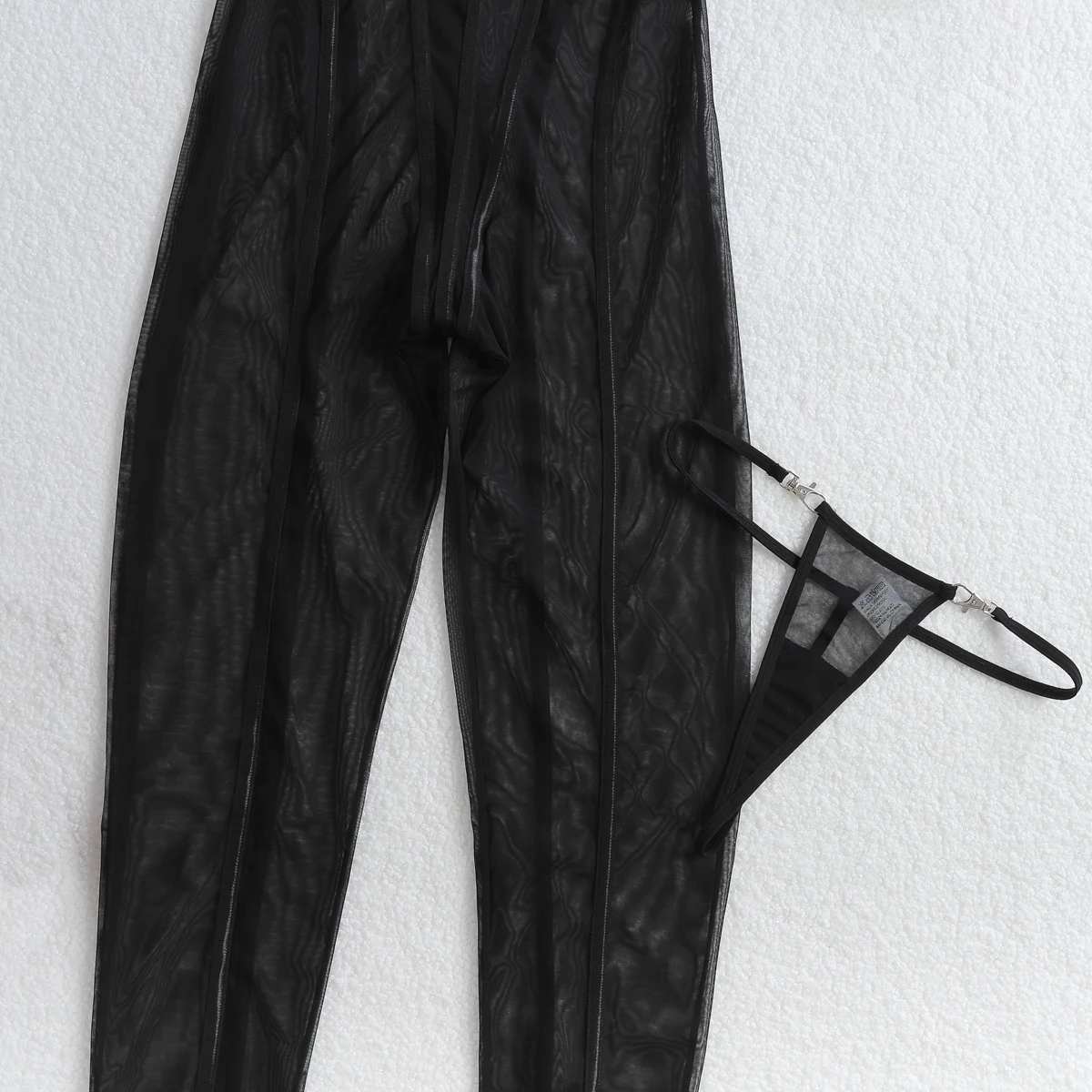 See-through black vertical stripe jumpsuit with seamless stretchy fabric
