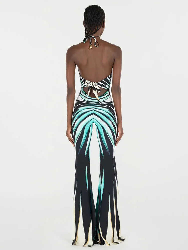 Sexy geometric print jumpsuit with halter neckline and wide flare legs