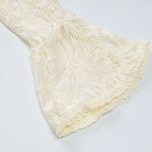 White lace fabric on a light gray background