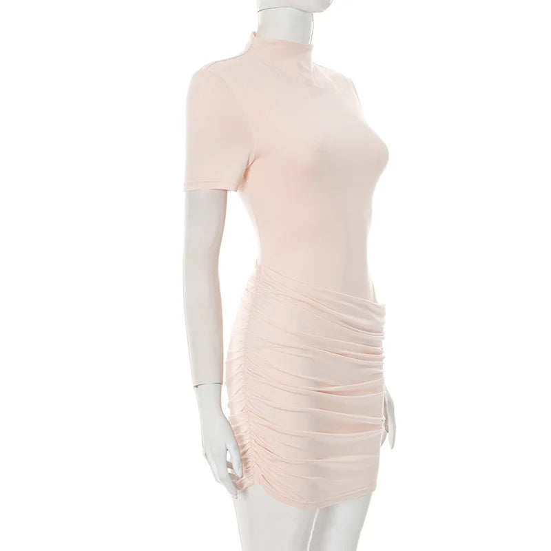 light pink ruched dress on a white background