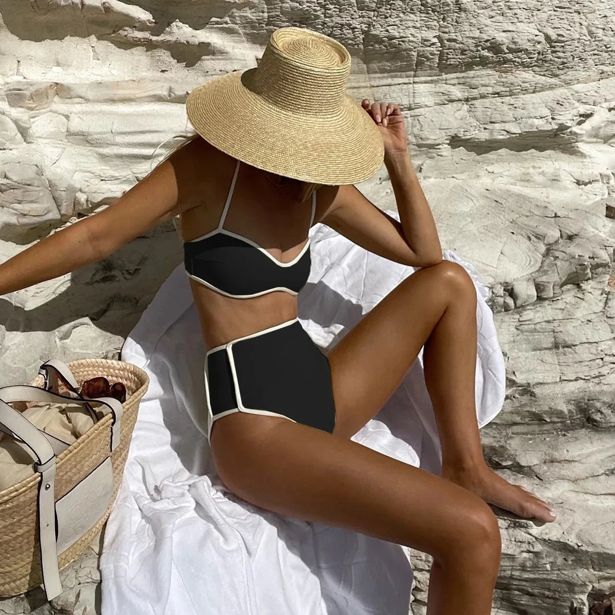 Two-piece black bikini with high-waisted bottom – chic Brazilian beach style