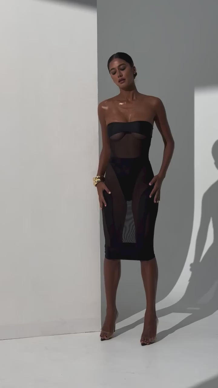 Slim-fit black mesh skirt and bandeau mesh top with contrasting opaque patchwork sections
